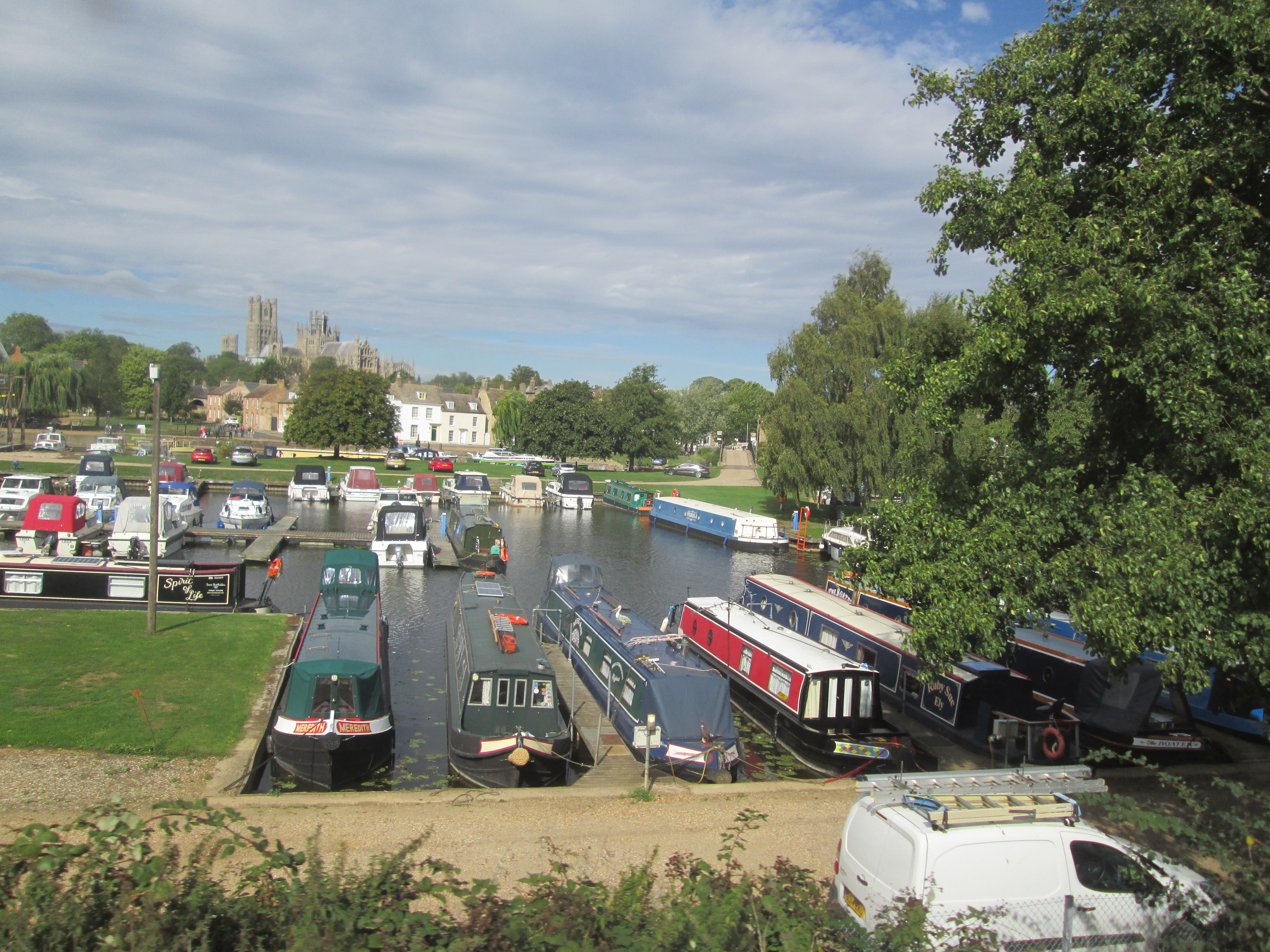 Ely Cathedral rising above the riverside marina on the River Great Ouse